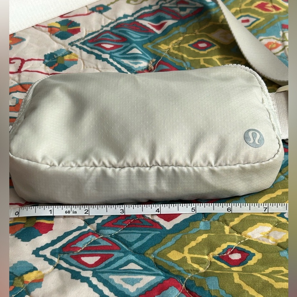 Lululemon belt bag in neutral beige two zipper compartments nylon lightweight